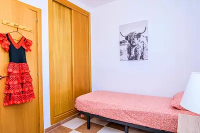 Cama o camas de una habitación en Beach House Millares
