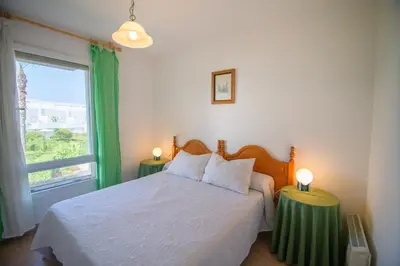 Cama o camas de una habitación en Mediterranea 4 Vera Playa Baria tus momentos frente al mar