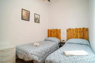 Cama o camas de una habitación en Paraje la Suerte Apartamento Crisantemo
