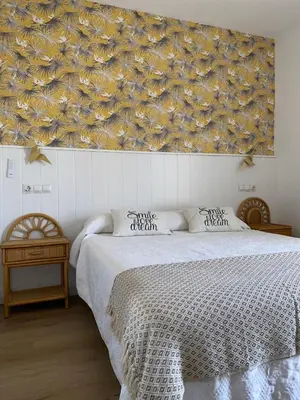 Cama o camas de una habitación en Apartamento PLAYA LAS VENTANICAS