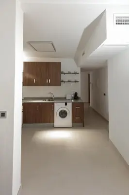 Una cocina o zona de cocina en apartamentos El-Hizan