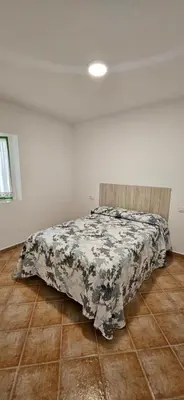 Cama o camas de una habitación en Casa Neptuno