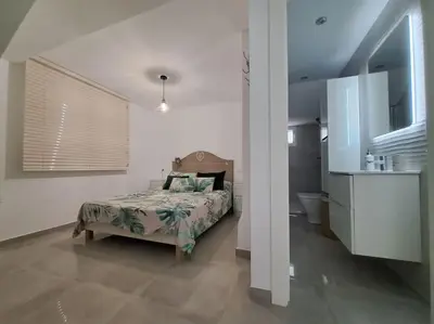 Cama o camas de una habitación en Nueva Almería beach & chill