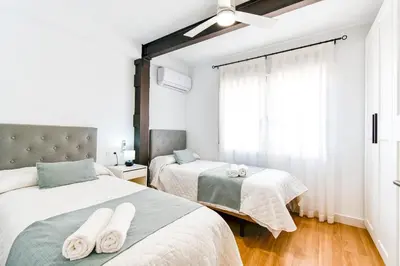 Cama o camas de una habitación en Moderno, con vistas y junto a la playa - by Aloha Palma
