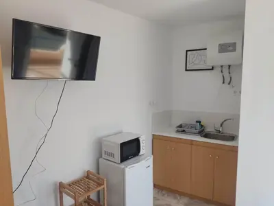 Una cocina o zona de cocina en Habitacion puerto 1 o 2 personas