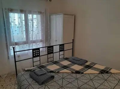 Cama o camas de una habitación en The Beach Hut with Lazy spa