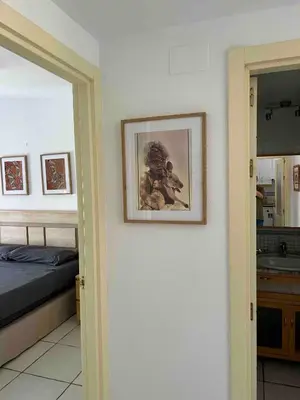 Cama o camas de una habitación en Ático junto al Mar,Acceso directo a la playa,Jardines de Nuevo Vera,WIFI