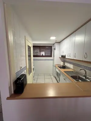 Una cocina o zona de cocina en Ático junto al Mar,Acceso directo a la playa,Jardines de Nuevo Vera,WIFI
