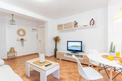 Una televisión o centro de entretenimiento en Trendy Homes Catedral