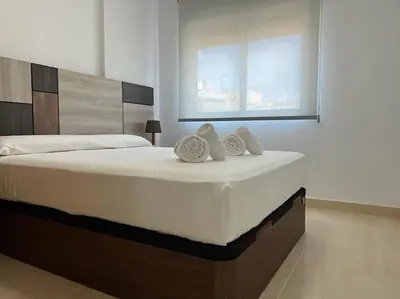 Cama o camas de una habitación en Fuensanta Home Beach Águilas
