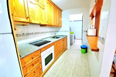 Una cocina o zona de cocina en Apartamento bajo VERAMAR 2 2ª línea 500 m de la playa