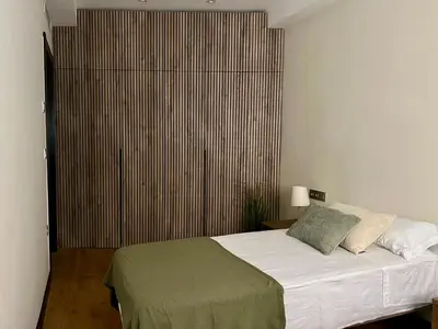 Cama o camas de una habitación en Apartamento moderno centro Aguilas 150m playa