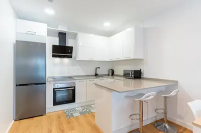 Una cocina o zona de cocina en ATP Vega de Acá a 5 minutos de la Playa - Parking Privado Gratis!