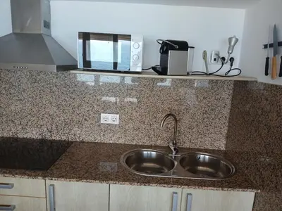 Una cocina o zona de cocina en Primera línea de playa en Villaricos