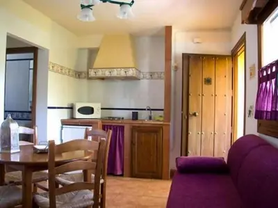 Una cocina o zona de cocina en APARTAMENTOS SIETE LAGUNAS