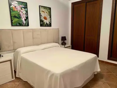 Cama o camas de una habitación en Piso en primera línea de playa, Vera Playa