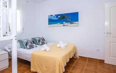 Cama o camas de una habitación en II Precioso apartamento con piscina y garaje II