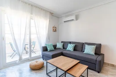 Zona de estar de TrendyHomes Retamar - Vistas al mar, playa a 1 min, golf