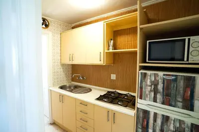 Una cocina o zona de cocina en Luminoso ático con vistas al mar