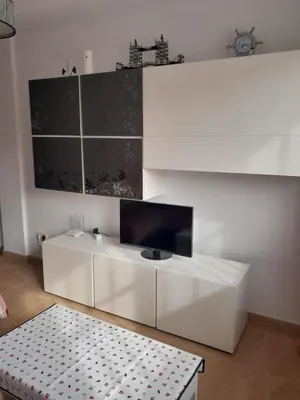 Una televisión o centro de entretenimiento en APARTAMENTO EL TIMON