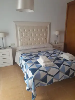 Cama o camas de una habitación en APARTAMENTO EL TIMON