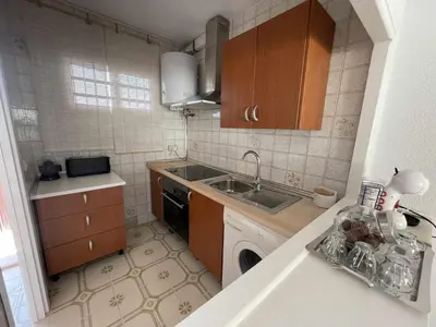 Una cocina o zona de cocina en Calabardina Playa con Wifi y aire acondicionado