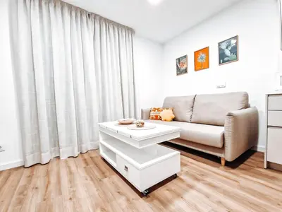 Zona de estar de Apartamento TIENDAS 8