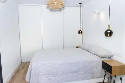 Cama o camas de una habitación en Ático Moderno Cañada Aguilar 10
