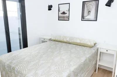 Cama o camas de una habitación en Ático Moderno Cañada Aguilar 10