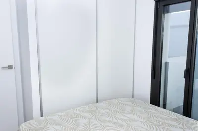 Cama o camas de una habitación en Ático Moderno Cañada Aguilar 10