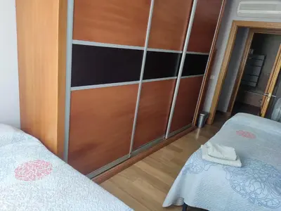 Cama o camas de una habitación en piso 3 habitaciones urbanizacion