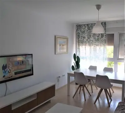 Una televisión o centro de entretenimiento en Aguadulce familiar y económico, Piscina Playa Wifi