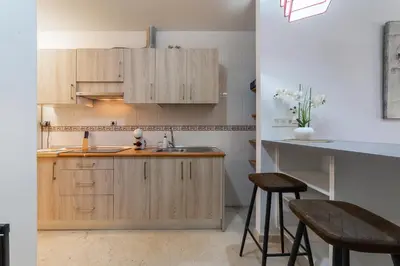 Una cocina o zona de cocina en AlmeriaSuite Beach&Sun