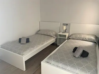 Cama o camas de una habitación en Apartamento Cine Wifi