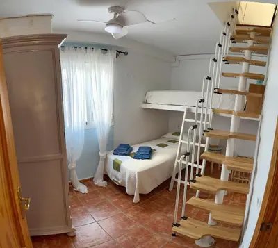 Cama o camas de una habitación en Casa Mellis Aguamarga