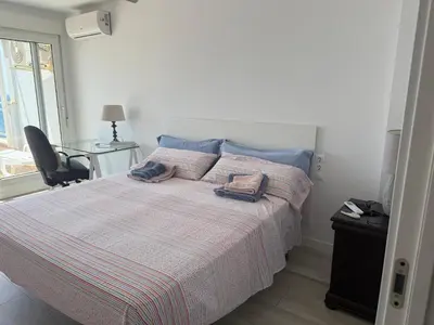 Cama o camas de una habitación en Ático con garaje en 1º línea de playa Almería