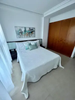 Cama o camas de una habitación en Apartamento exclusivo con vistas a la piscina
