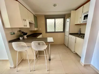 Una cocina o zona de cocina en Apartamento exclusivo con vistas a la piscina
