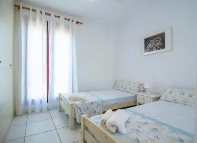 Cama o camas de una habitación en Atico Junto al Mar Jardines de Nuevo Vera Acceso directo a la playa WIFI