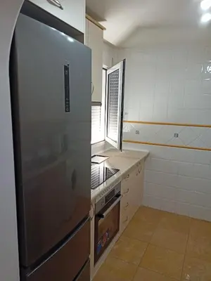 Una cocina o zona de cocina en Cozy flat Terreros