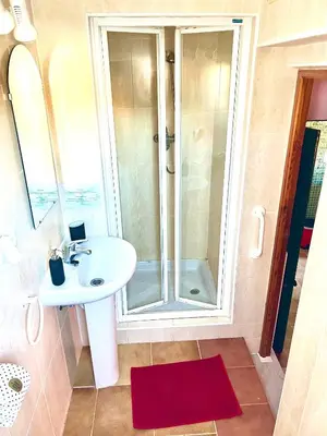 Un baño de Rambla Retreats Apartment Rojo with shared pool & hot tub Stunning views in Oria