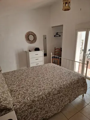 Cama o camas de una habitación en Casa De La Familia - Appartement