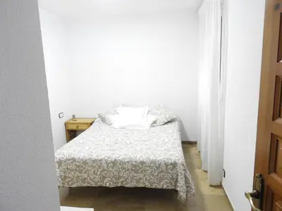 Cama o camas de una habitación en Aguadulce Primera Línea - A/C