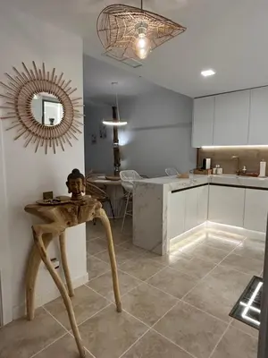 Una cocina o zona de cocina en Zen Garden Apartment