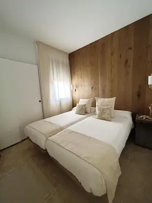 Cama o camas de una habitación en Zen Garden Apartment
