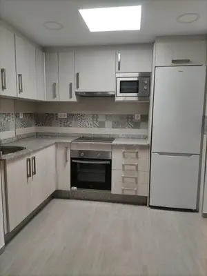 Una cocina o zona de cocina en Apartamento reformado con piscina y vistas