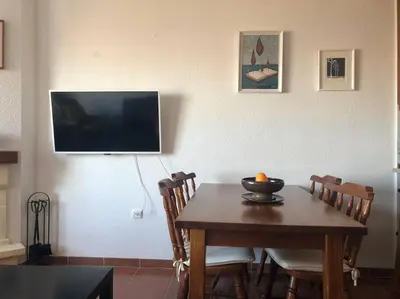 Una televisión o centro de entretenimiento en Apartamento en las salinas de Cabo de Gata