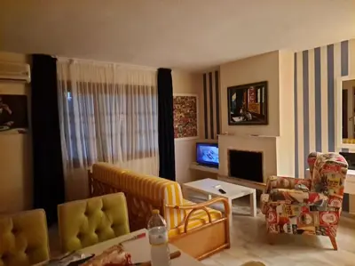 Una televisión o centro de entretenimiento en Vera Shore 4 persons 2 pools and beach 200 m