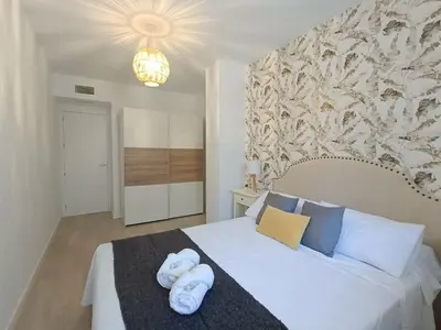 Cama o camas de una habitación en Alejandría Suites Aguadulce Sur, 2Hab, terraza, WiFi, Piscina y garaje