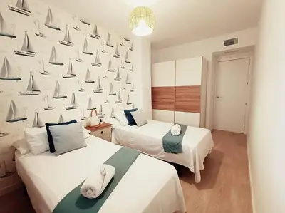Cama o camas de una habitación en Alejandría Suites Aguadulce Sur, 2Hab, terraza, WiFi, Piscina y garaje